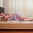 Asian sad woman on the bed in bedroom.
